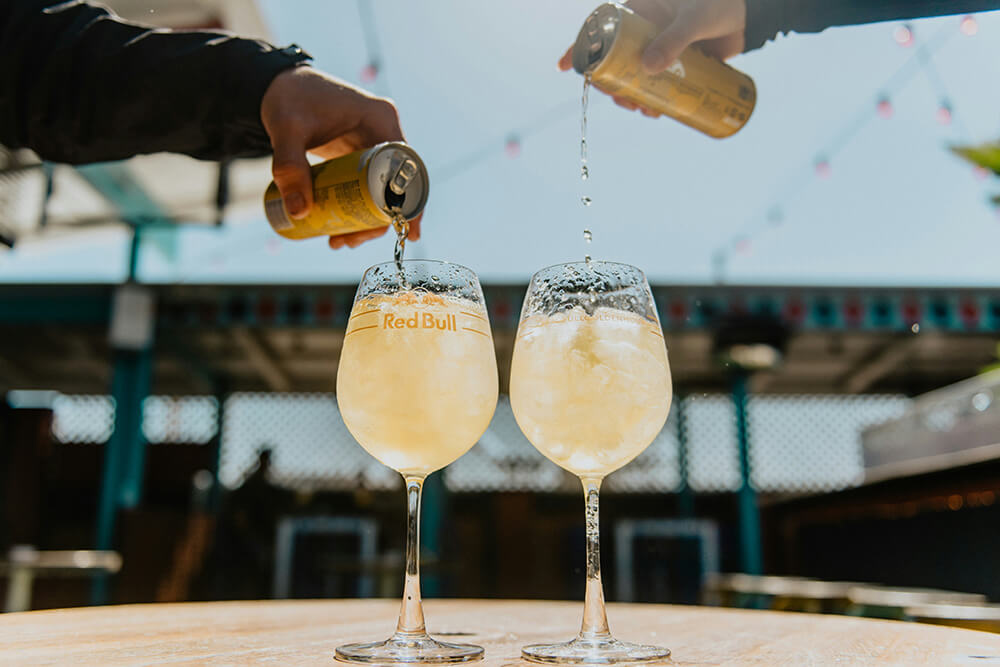 Redbull with ice in glasses - Champers Drinks