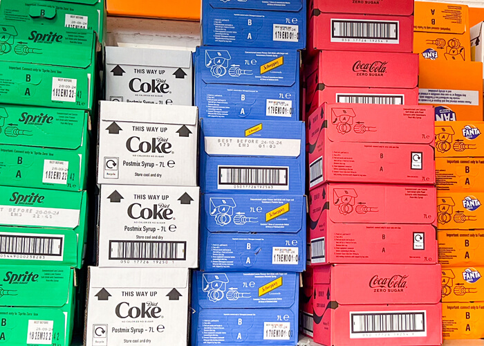 Soft drinks packs in a wearhouse - champers drinks