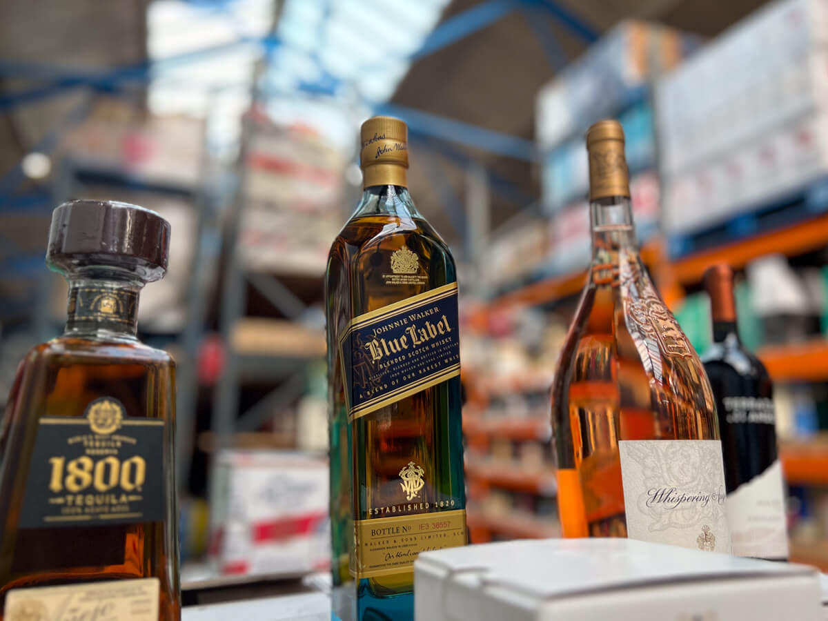 Tequila 1800 Bottle and Johny Walker Blue Label Bottle - Champers Drinks