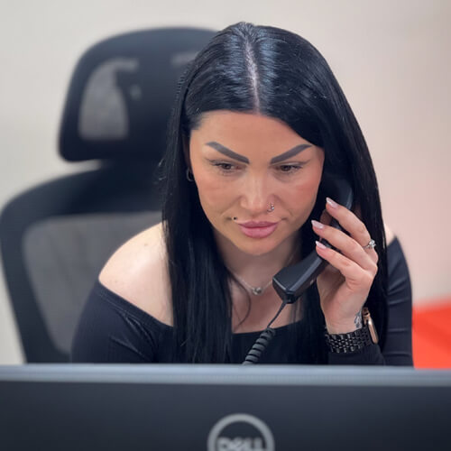 Customer support lady on phone - Champers Drinks