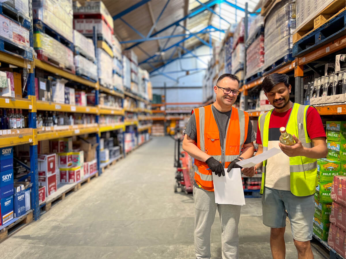 Two workers in the wearhouse - Champers Drinks